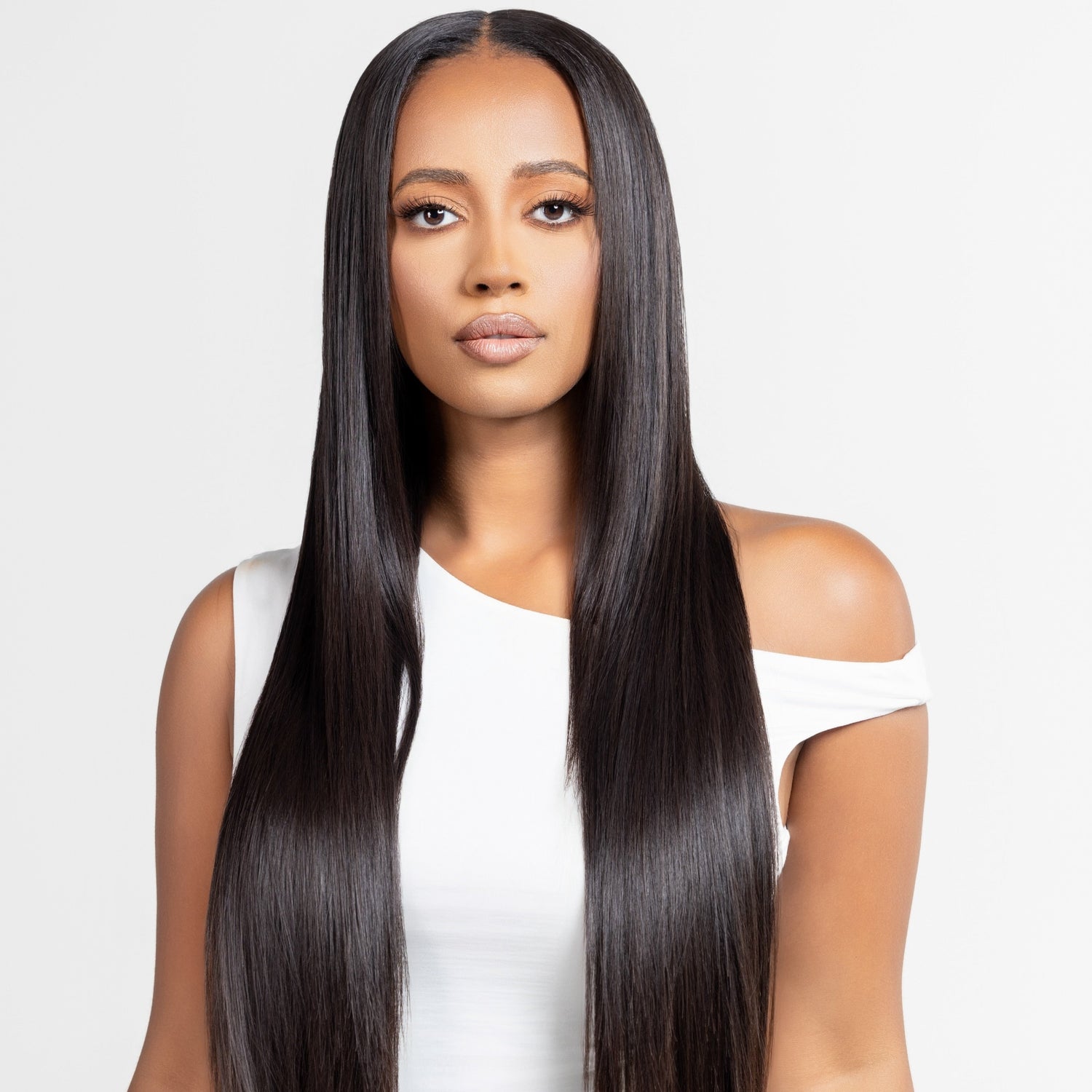 Straight, long brunette wig designed for alopecia and hair loss, styled for fashion purposes. The wig features smooth, glossy hair with a natural-looking parting.